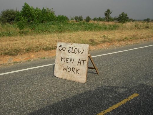 go_slow_men_at_work