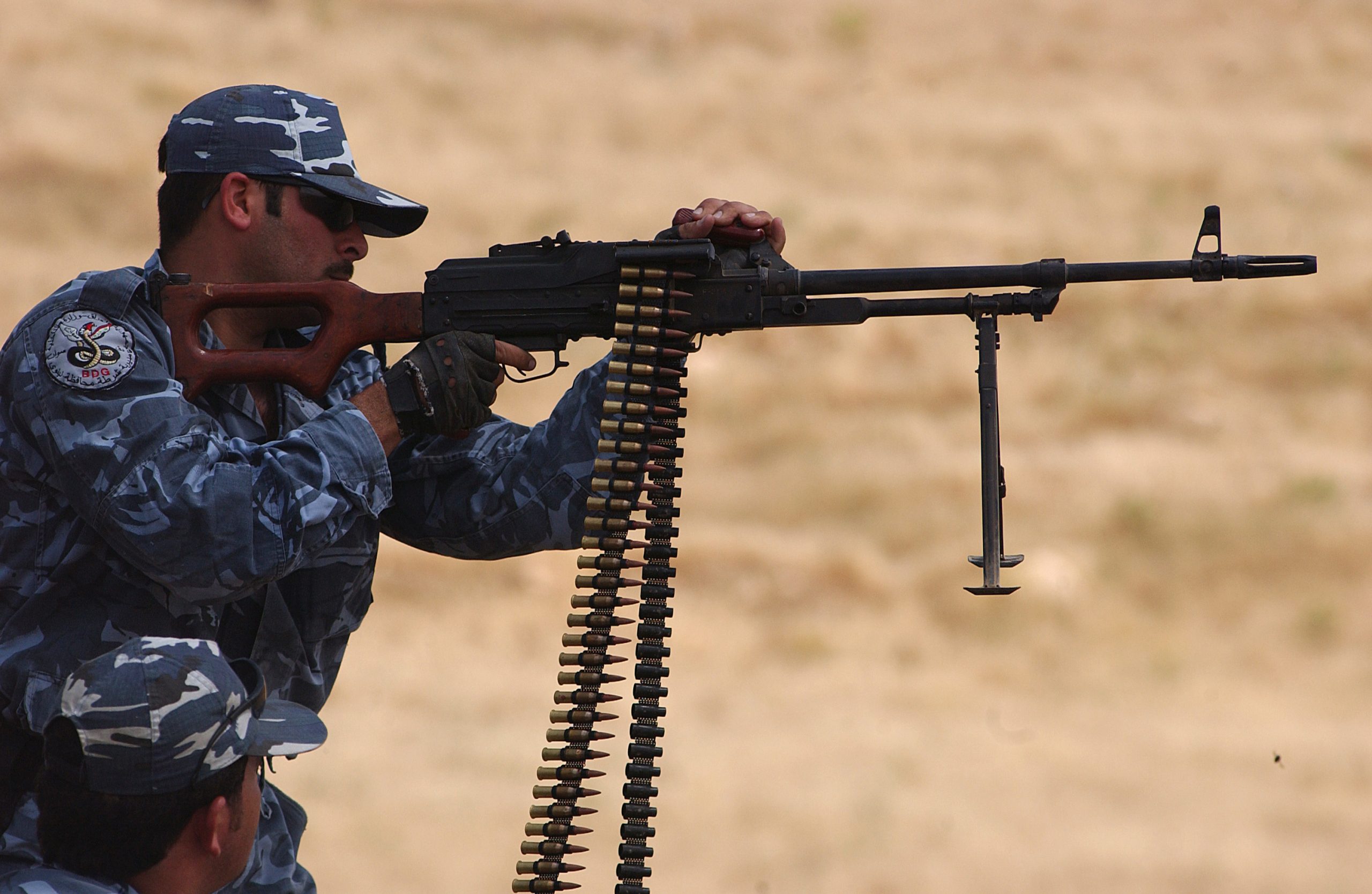 a_kurdish_peshmerga_officer_fires_a_pkm_in_mosul_wiki