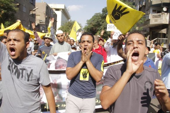 anti-coup_protesters_march_in_maadi-cairo_20-sep-2013_voa